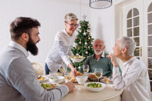 Family gathered over for Christmas holidays, celebrating, having lunch